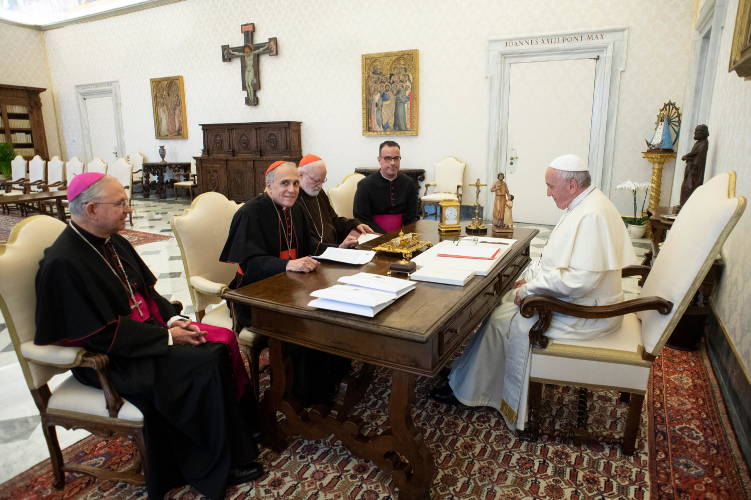 Pope Francis meets with officials representing the U.S. Conference of Catholic Bishops at the Vatican Sept. 13. Pictured from left are Archbishop Jose H. Gomez of Los Angeles, vice president of the conference, Cardinal Daniel N. DiNardo of Galveston-Houston, president of conference, Cardinal Sean P. O’Malley of Boston, president of the Pontifical Commission for the Protection of Minors, and Msgr. J. Brian Bransfield, general secretary of the conference.